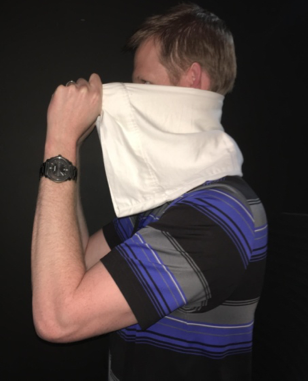 Cervical retraction exercise with a towel